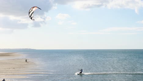 tourists-and-residents-enjoy-fishing-and-kitesulf-boarding-in-Urangan-Pier,-hervey-bay-QLD,-Australia