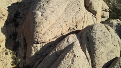 An-aerial-revealing-shot-of-Red-Rock-Canyon,-outside-Las-Vegas,-Nevada