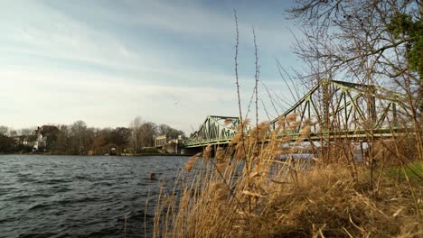 Windy-day-large-body-water-flowing-under-Glinicker-Brücke-bridge-in-Germany,-static