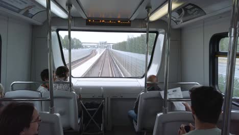 Timelpase-Landscape-view-of-the-front-view-of-skytrain-in-Vancouver-city-see-train-railway-while-train-is-moving