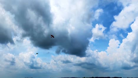 Planes-doing-aerobatics-stunts-performance-at-battle-creek-field-of-airspace-and-hot-balloon-festival-in-Michigan,-USA