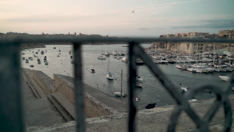 Harbour-of-Valletta,-Malta-during-national-ceremony-camera-pulls-back