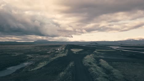 Various-shots-by-drone-of-an-icelandic-glacial-river-in-beautiful-sunset-light
