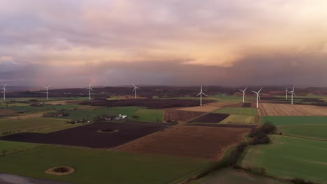 Aerial-view-of-wind-turbine-park-on-green-fields