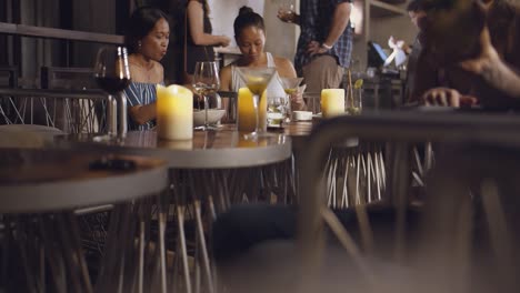 People-Enjoying-Drinks-in-a-Bar