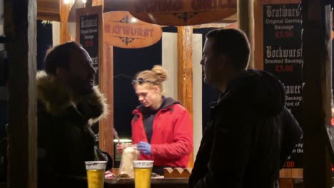 Liverpool-City-Christmas-market-bar-selling-mulled-wine---alcohol-in-festive-wood-cabin