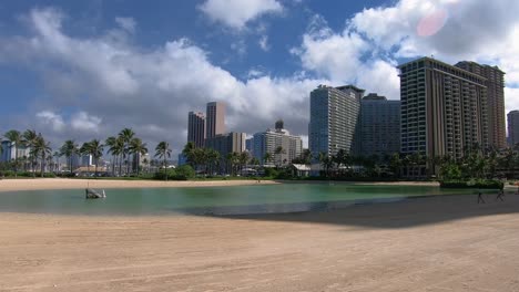 Luxury-buildings-with-palm-trees-and-water-surface-in-Hawaii