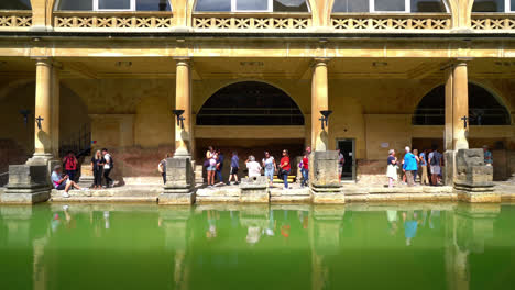 Bath-England,-Circa-:-Roman-Baths,-the-UNESCO-World-Heritage-site-with-people,-which-is-a-site-of-historical-interest-in-the-city-of-Bath,-UK