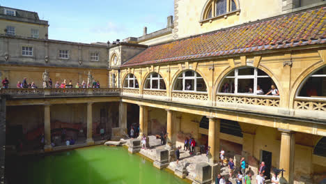 Bath-England,-Circa-:-Roman-Baths,-the-UNESCO-World-Heritage-site-with-people,-which-is-a-site-of-historical-interest-in-the-city-of-Bath,-UK