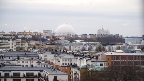 Ericsson-Globe-from-afar,-with-apartment-buildings-in-the-foreground