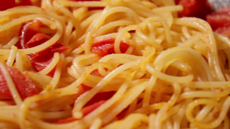 Cooking-tomato-spaghetti-in-a-pan