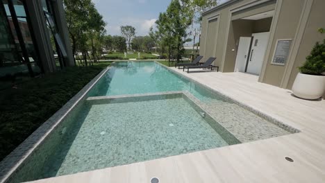 Modern-Contemporary-Pool-House-Exterior-Design-With-Green-Garden