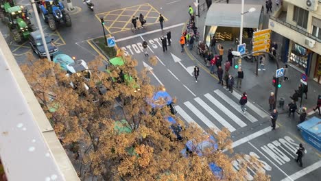 Top-view-of-a-line-of-tractors-in-a-protest-in-Spain-due-to-the-precarious-prices