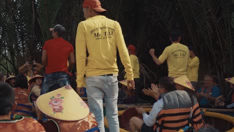 Vietnamese-Adults-Dancing-on-the-River-in-Basket-Boats