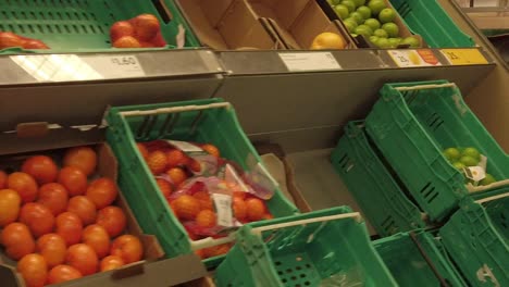Slow-motion-interior-empty-UK-supermarket-passing-fresh-fruit