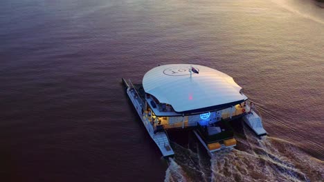 YOT-Club-Cruising-On-Calm-River-During-Sunset---Super-Yacht-As-Entertainment-Venue---Marina-Mirage,-Australia