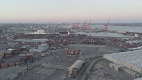 Aerial-view-across-Peel-Port-harbour-distribution-cargo-freight-shipyard-descending