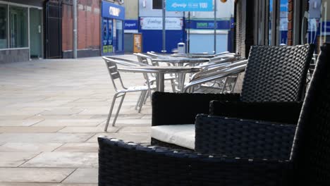 Empty-small-town-closed-retail-cafe-chairs-recession-closure-due-to-corona-virus-dolly-left