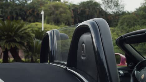 Two-black-seats-of-Porsche-Boxster-cabriolet