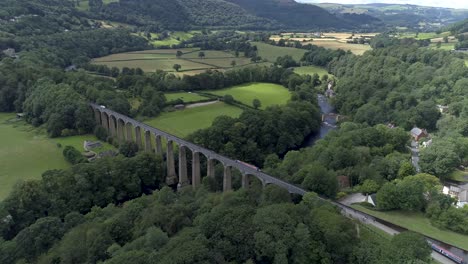 Right-to-left-aerial-orbital-of-Llanollen-aqueduct-in-the-Vale-of-Llangollen,-East-Wales