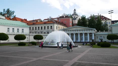 Fountain-inside-Vilnius-presidential-palace-while-people-walking-around