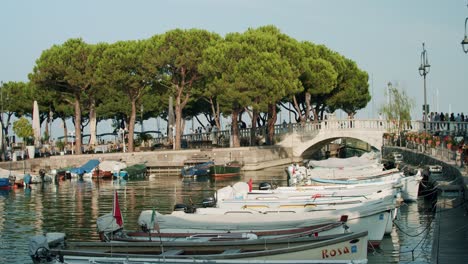 tourists-and-locals-walking-through-Desenzano-del-Garda-port