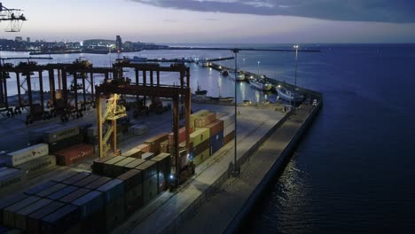 4k-Drone-Shot-of-Container-Gantry-Cranes-And-Entrance-To-Table-Bay-Harbour-Cape-Town-South-Africa