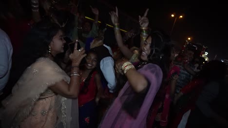 People-dancing-wildly-on-the-street-in-the-Indian-wedding-Baraat