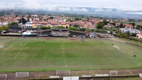 Panning-aerial-view-of-soccer-stadium-quite-empty-for-Corona-Virus-pandemic