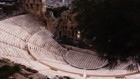 Odeon-of-Herodes-Atticus-located-at-the-foot-of-the-Acropolis-in-static-top-view-shot-of-main-acting-stage