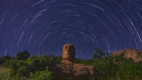 Stone-Statute-Moving-Stars-in-the-Dark-Blue-Sky-in-Hyrcanian-Forest-In-Iran-Mazandaran-Nature