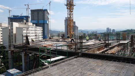 Trabajadores-De-La-Construcción-Que-Trabajan-En-El-Sitio-De-Construcción