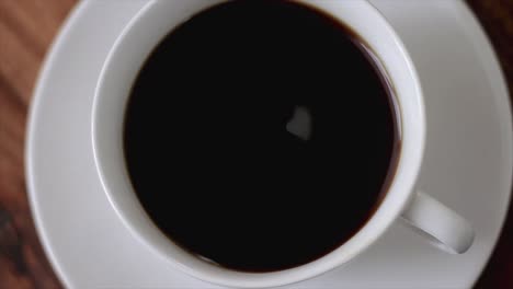 stirring-a-cup-of-coffee-stock-video-stock-footage