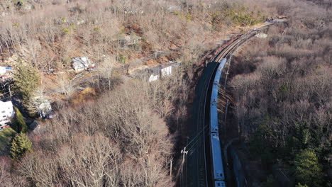 And-aerial-view-over-a-silver-train-on-a-sunny-day
