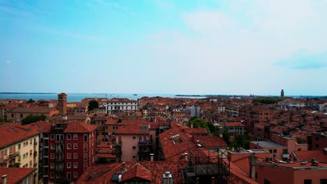 Aerial-Flying-Over-Orange-Rooftops-In-Venice