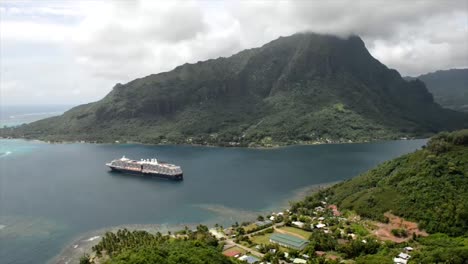 Cruise-ship-anchored-in-Opunohu-Bay-and-Mount-Rotui-view-from-Belvedere-Lookout,-Moorea-island,-French-Polynesia