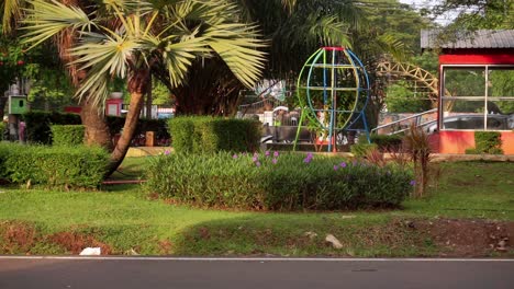 city-park-atmosphere-between-road,-Semarang,-Central-Java,-Indonesia-on-June-10,-2022
