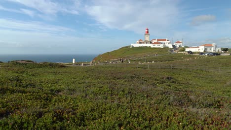 Panoramic-View-of-Cabo-da-Roca-Monument-with-People-Walking-on-the-Most-Westerly-Point-of-Mainland-Europe