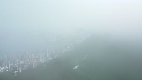 Vista-Estática-De-Revelar-El-Paisaje-Urbano-De-Hong-Kong-Desde-La-Nube