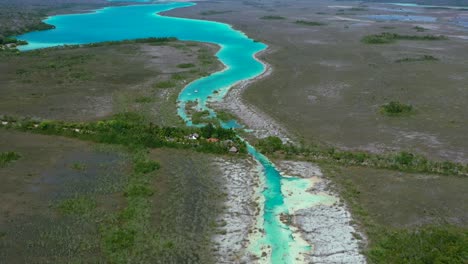 panoramic-view-of-tropical-turquoise-blue-Bacalar-Lagoon-in-Mexico,-aerial