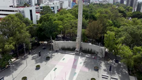 Partial-Orbit-Around-the-Monument-to-the-Mother-showing-the-Esplanade-with-a-Purple-Feminist-Cross-Painted-on-it-in-Mexico-City