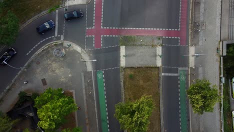 Cars-turn-left-at-an-intersection-on-a-road
Daring-aerial-view-flight-bird's-eye-view-drone-footage-of-Freie-Universität-berlin-dahlem-Summer-2022