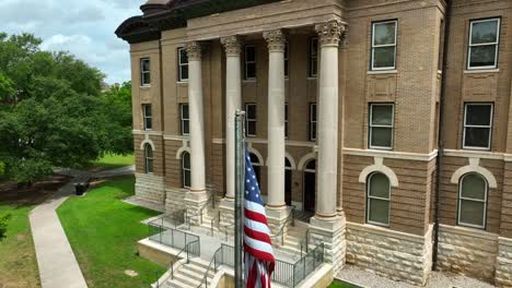 Old-brick-courthouse-building-with-USA-flag