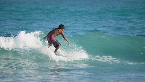 Male-Surfing-Wave-In-The-Galapagos-Islands