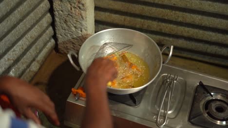 fish-frying-on-pan-Karnataka-Mysore-mysure-India-poor-house