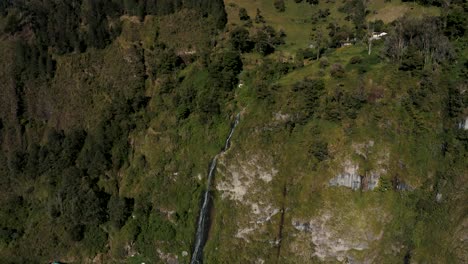 Aerial-View-Of-Cascada-De-La-Virgen-Waterfall,-Banos-Ecuador---Drone-Shot