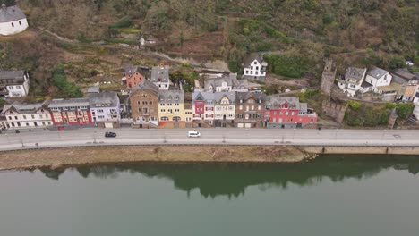 drone-images-from-a-higher-altitude-flying-over-the-Moselle-river-and-the-German-town-of-Cochem-with-its-beautiful-houses