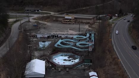 Aerial-Drone-Footage-Orbiting-Left-around-the-Abandoned-Fugates-Entertainment-Center-Water-Park-in-Eastern-Kentucky