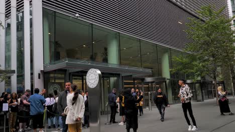 City-of-London-England-September-2022-Pan-right-establishing-the-Sky-Garden-entrance-at-Fenchurch-Street-with-crowds-waiting-to-go-in