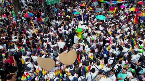 Rainbow-people-celebrating-equality-at-the-LGBTQ-Gay-Pride-Parade---Aerial-view